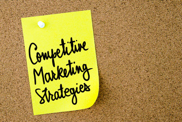 Competitive Marketing Strategies text written on yellow paper note