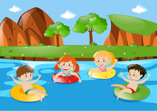 Four children swimming in the stream