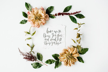 round frame wreath pattern with inspiration quote written in calligraphy style, beige dried peonies flowers, branches and leaves isolated on white background. flat lay, top view, mock up