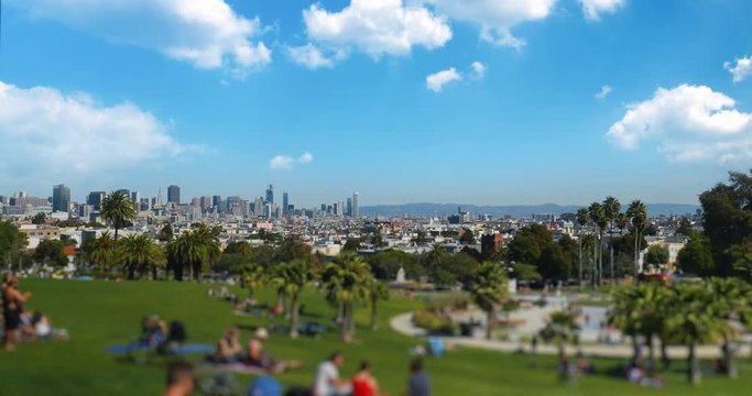 SAN FRANCISCO, CA - Circa October, 2016 - A tilt shift establishing shot of Mission Dolores Park with the San Francisco skyline in the distance.	 	