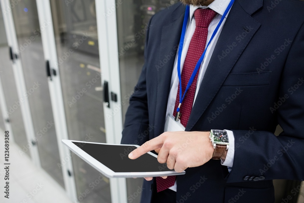 Aufkleber technician using digital tablet