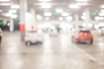 blur cars parking with bokeh light Background for use as Backgro