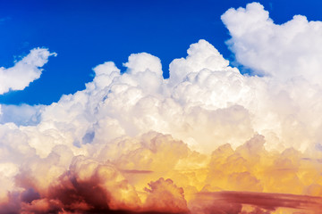 deep blue sky background with two tone clouds