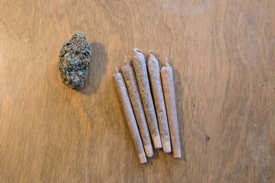 Marijuana or Cannabis bud dried flower and joints arranged