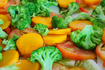 Fototapeta na wymiar cooked vegetables: tomato, brocoli, carrot