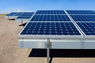 solar panels installed at a high school help to meet its energy needs