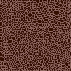 seamless pattern in reptile skin style, in brown colors. Hand drawn vector stock illustration