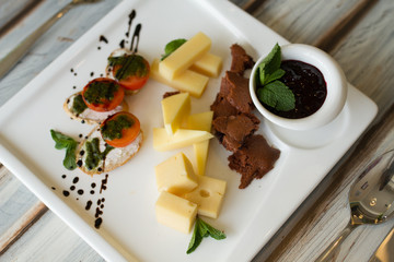Cheese and tomato appetizer on a table