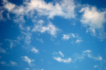 Fototapeta premium white fluffy clouds in the blue sky