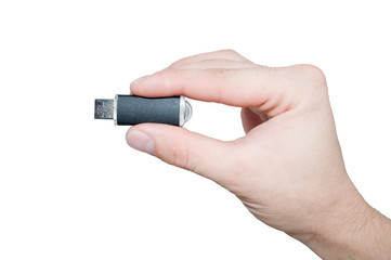 Hand with black usb on white background