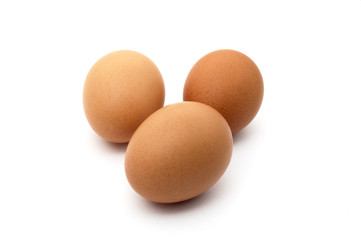 three eggs isolated on white background