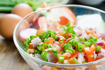Preparing to cook omelette.