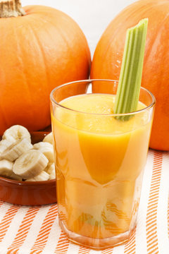 banana pumpkin smoothie in a glass
