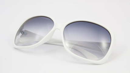 white sunglasses on white background