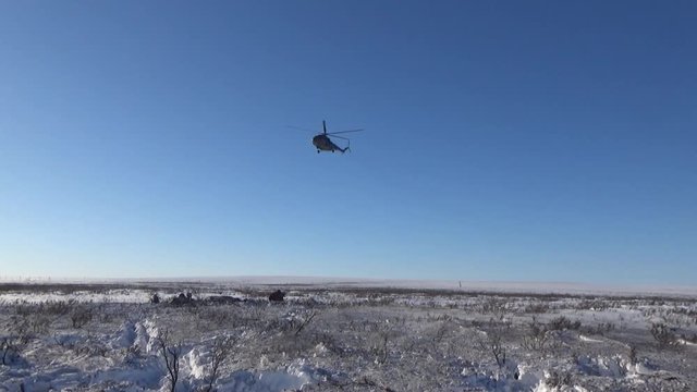 Helicopter in the winter sky