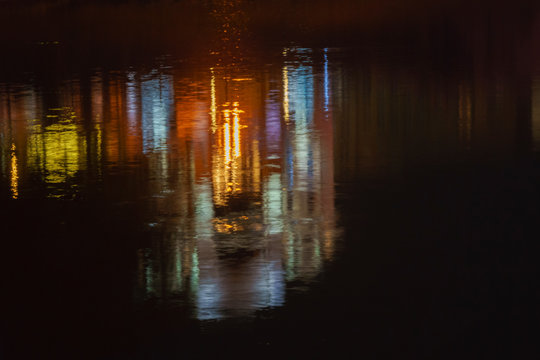 reflection in the water of illumination the bridge