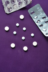 Medicine pills on  with a empty pill blister pack