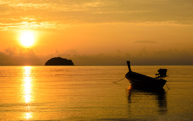 Fishing boat in sunrise