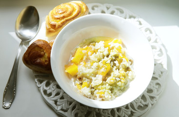 Healthy homemade porridge with millet, rice, pumpkin in a jar for breakfast, selective focus