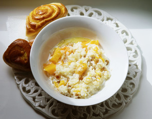 Healthy homemade porridge with millet, rice, pumpkin in a jar for breakfast, selective focus