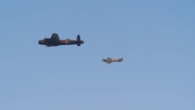 Slow motion display of world war two bombers and fighter