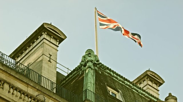 Early Morning Street view on the Piccadilly Street with the British Flag.