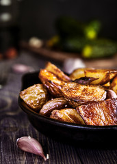 Baked potato wedges with garlic, christmas garnish