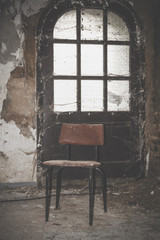 Fototapeta na wymiar chair in front of a door