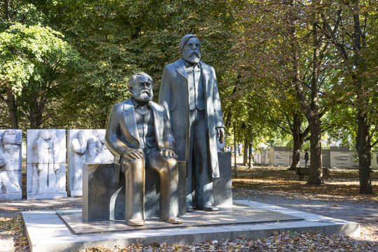 The statues of Karl Marx and Friedrich Engels in a park of Berlion