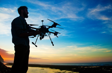 Fototapeta na wymiar manholding a drone for aerial photography. 