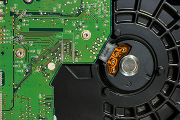 Inside of computer hard disk drive (part, close up)