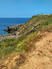 Fototapeta na wymiar Ocean cliffs near Cabo Carvoeiro daylight, Peniche