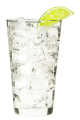 Tall pint glass gin and vodka tonic limeade lemonade sparkling water with gas isolated on white...
