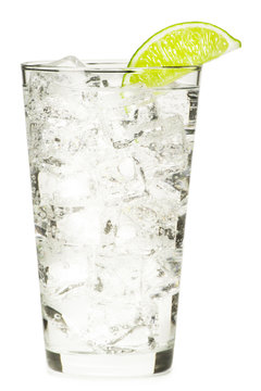 Tall pint glass gin and vodka tonic limeade lemonade sparkling water with gas isolated on white background