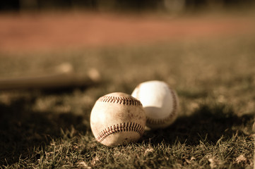 Sepia Baseball Balls on Grass