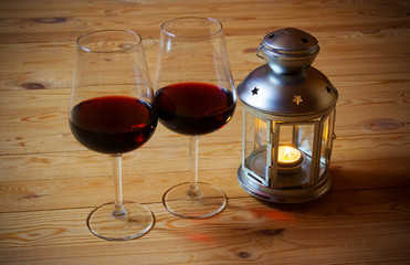Wine and  lantern on wooden background