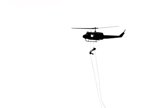 silhouette soldiers in action rappelling climb down from helicopter with military mission counter terrorism assault training isolated on white background.