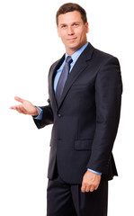 Confident male man businessman ceo presenter showing explaining presenting gesturing isolated on white background