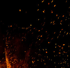 fire flames with sparks on a black background