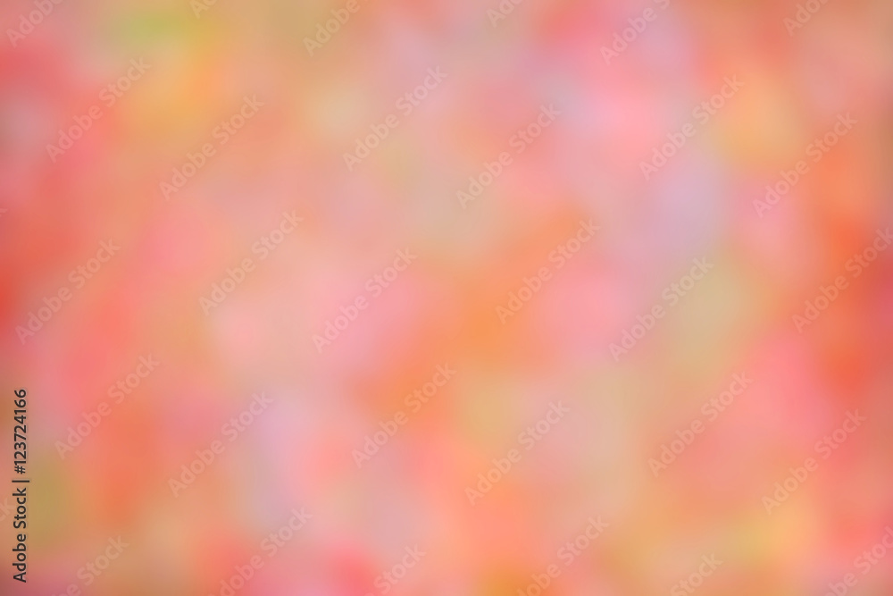Poster Autumn. Blurred Fall Abstract autumnal background with colorful leaves and sun