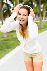 Playful Young Woman in Park