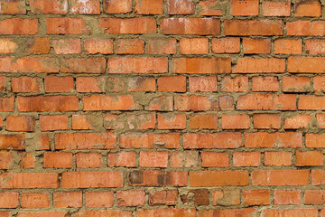 Building wall of red bricks