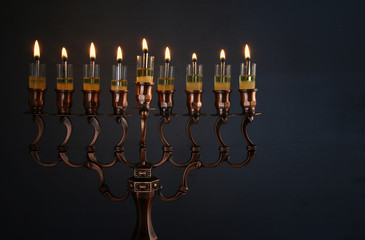 Low key Image of jewish holiday Hanukkah background
