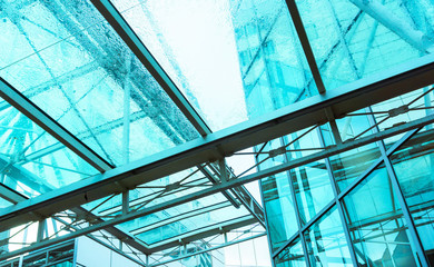 View of a modern glass skyscraper buildings around