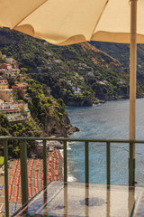 Summertime seascape. Amalfi coast: Positano beach.Italy (Campania).Panoramic view from the tables of a bar.