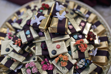 Many decorated chocolates for the wedding guests