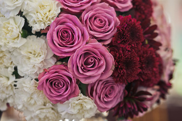 Pink and white flowers in the wedding bouquet