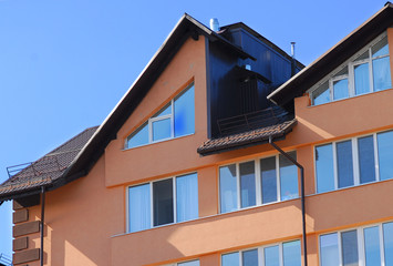 Urban house or building, facade pattern. blue sky