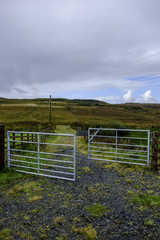 Open metal farm gate