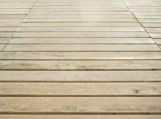 Obraz premium Close up of composite decking. Wood planks. Kiln dried wooden lumber texture background. Timber hardwood wall.